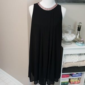 Easy to wear sleeveless free flowing mini